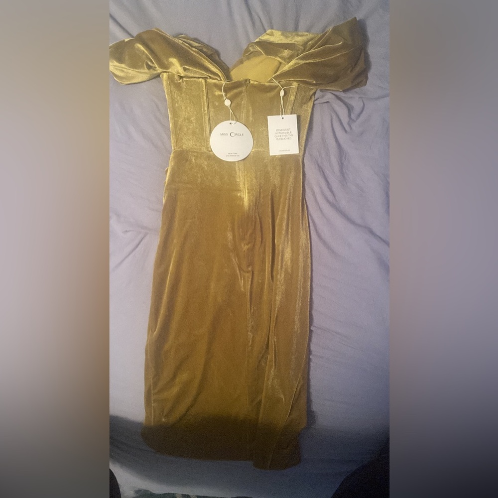 Gold velvet party dress . Never worn all tags , great fit size XS